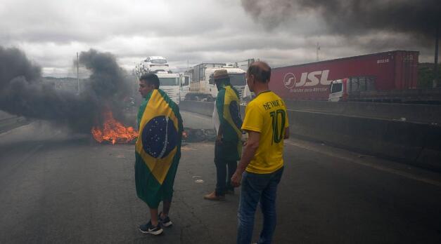 Brazil’s Bolsonaro declines to concede, but OKs transition