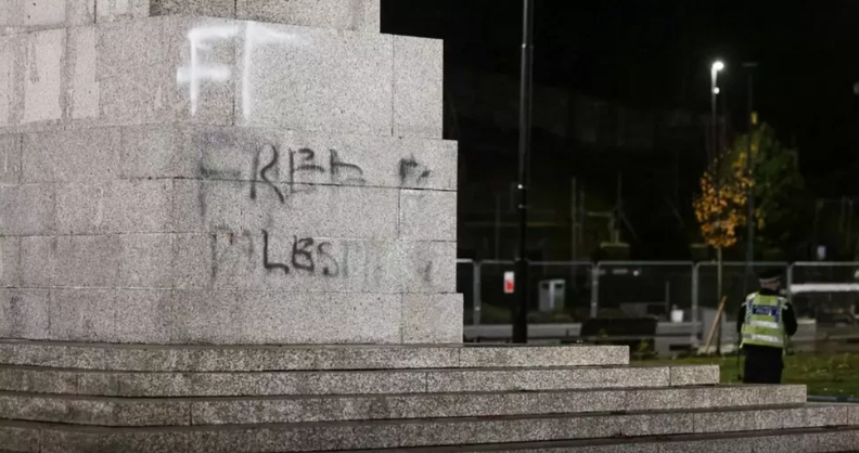 Police guard cenotaph in Rochdale after it was daubed with ‘Free Palestine’ graffiti